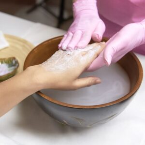 Hand care treatment at nail salon in 92105 with professional moisturizing and skin care